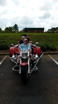 GEORGE & DIANA MOLL on their trike motorcycle