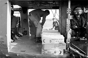 C-rations being off loaded to troops