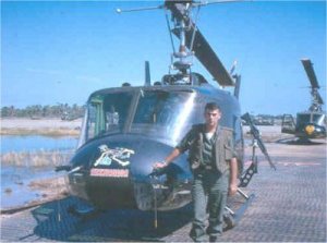 Lt. Roger Winslow with maintenance ship "roadrunner" Vinh Long 1964